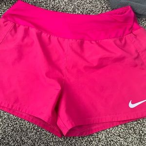 Pink Nike shorts